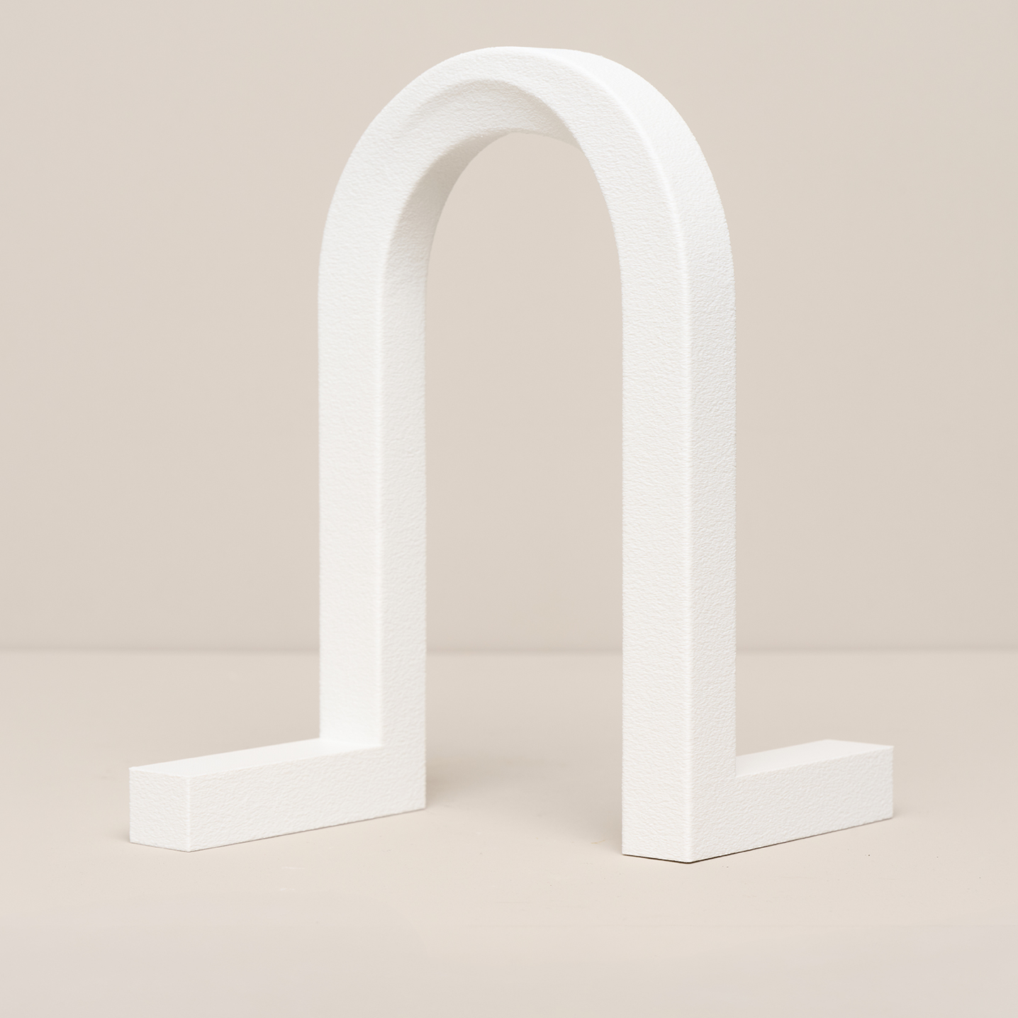 The Twisted Arch — studio prop for product photography